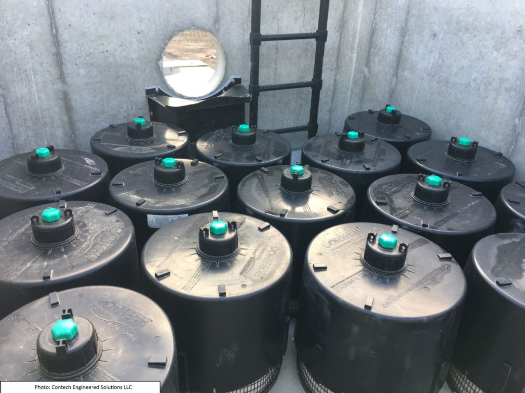 These cartridge filter cylinders fill the bottom of the vault and remove pollutants and sediment from stormwater before discharging it to the lake.
