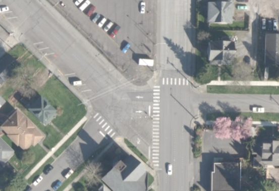 A 2013 aerial shows a poorly defined intersection at Garden, Champion and Ellis streets. The next photo from 2016 shows changes to improve runoff control and safety.