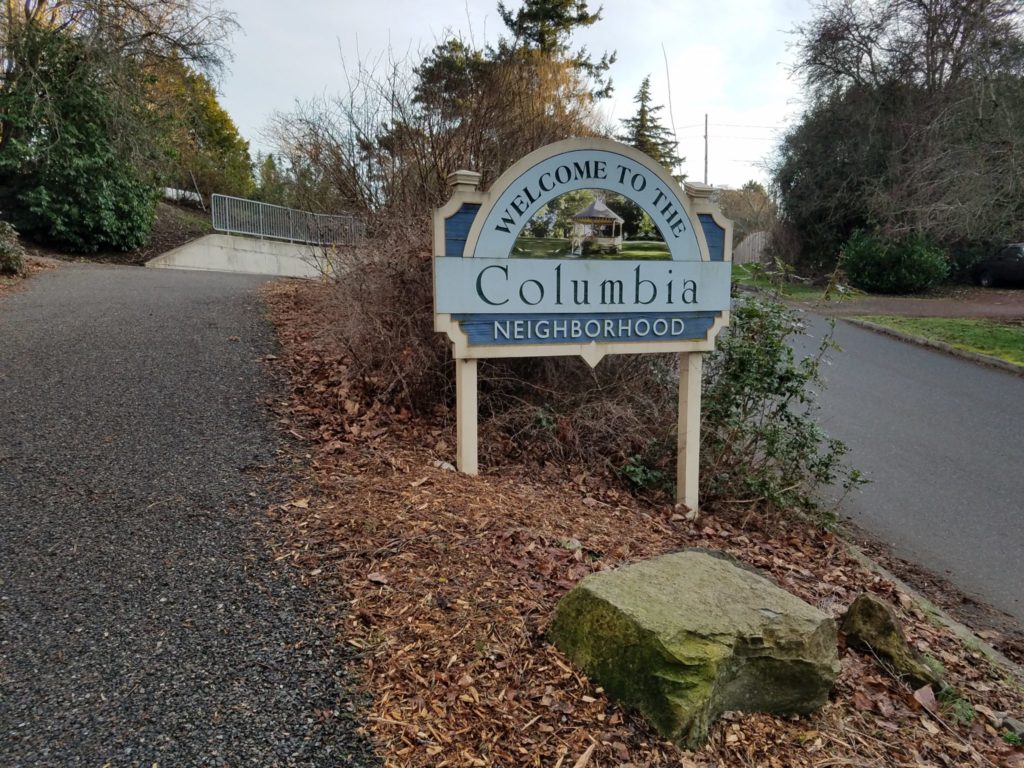 The pervious sidewalk next to the entrance to Columbia Neighborhood provides onsite protection for Squalicum Creek's water quality.